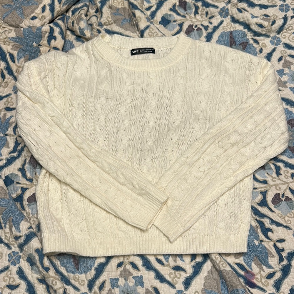 White knitted sweater
